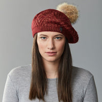 BÉRET À CHEVRONS AVEC POMPON EN FOURRURE RECYCLÉE